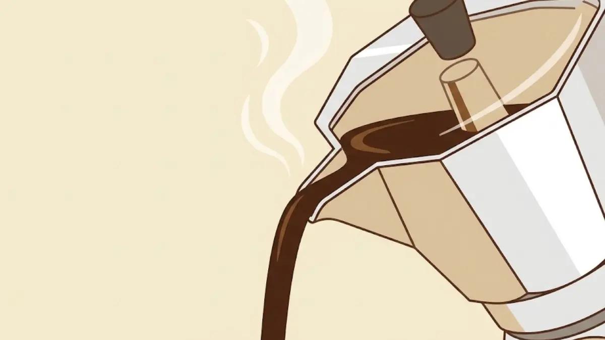 Coffee flowing from moka pot spout during brewing process